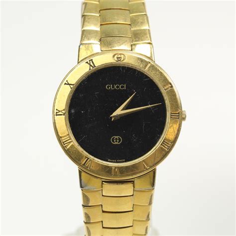 gucci gold watch for men.